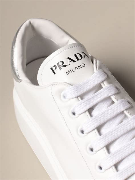 white canvas prada shoes with navy stripes and yellow lining|prada shoes for women.